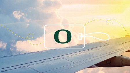 The UO O logo against the background of a plane wing