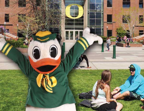 A faux-3D design of the Duck mascot in front of the Lillis Business Complex
