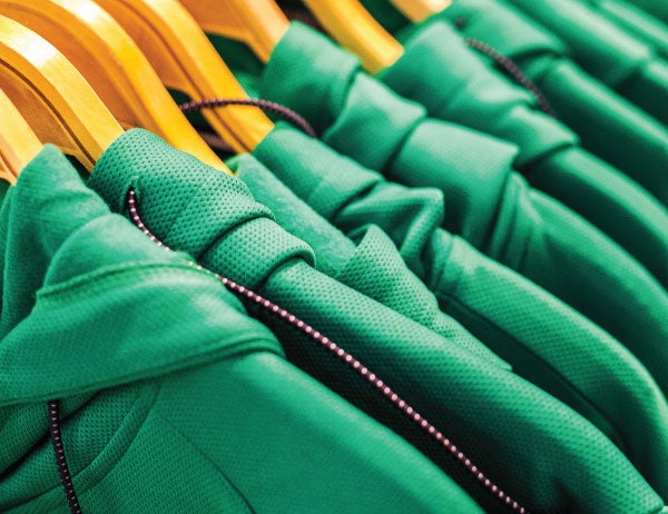Close up photograph of racks of clothing at the Duck Store