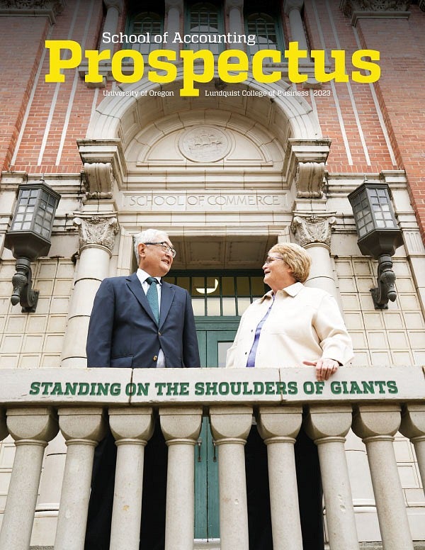 Cover of the School of Accounting's 2023 Prospectus, featuring Steven Matsunaga and Robin Clement standing outside the doors to Anstett Hall