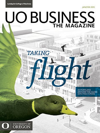 Cover image of the issues showing a artist rendering of a Portland building in the background faded out with a colorful mallard duck in green tones seeming to fly from the spine of the magazine over the building image