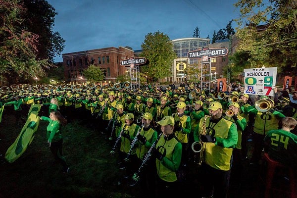 The UO marching band plays in front of the Lillis Business Complex during College GameDay