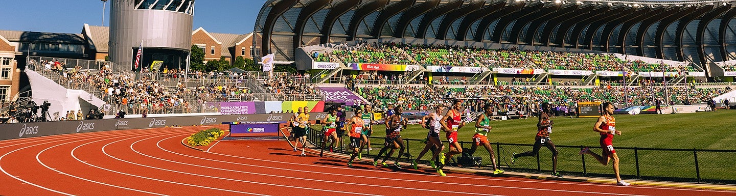 Track athletes are pictured mid-stride during a race at UO's Hayward Field