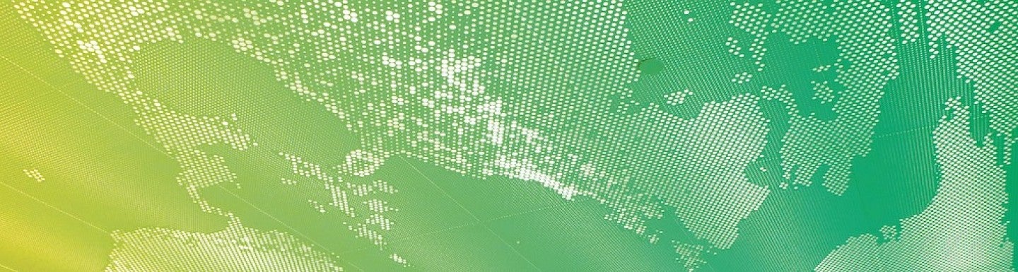 Illustration of a world map with dots and a green and yellow gradient