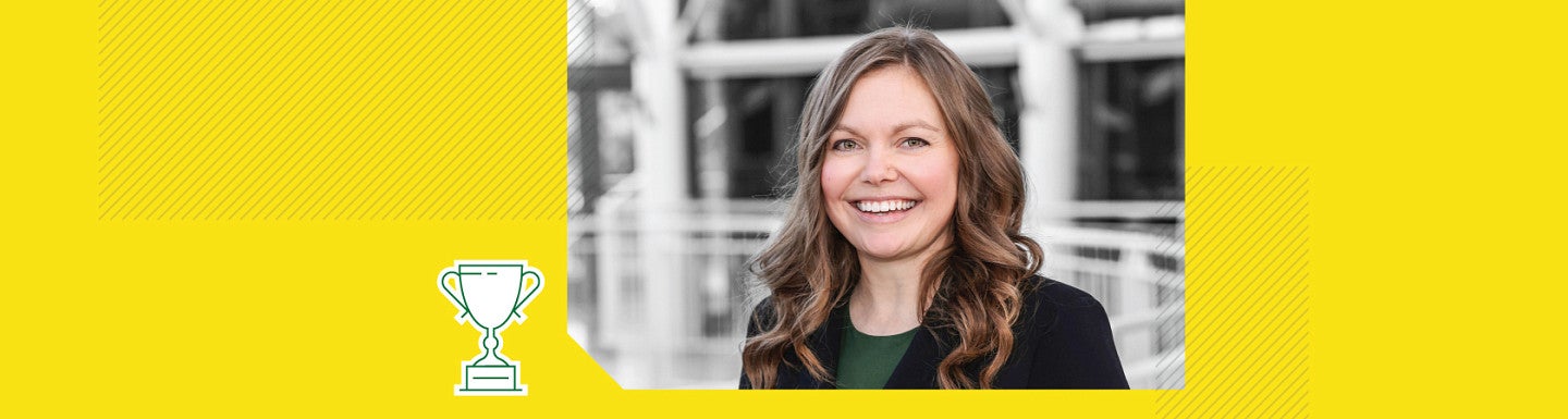 Photo of Laura Wellman next to a simple digital art icon of a trophy