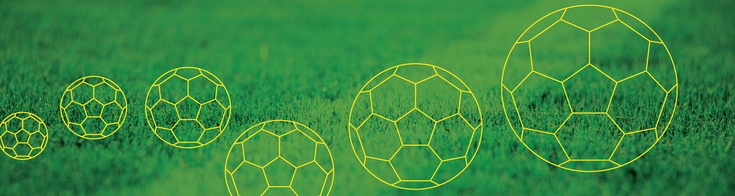 Graphic of soccer balls against background of grass