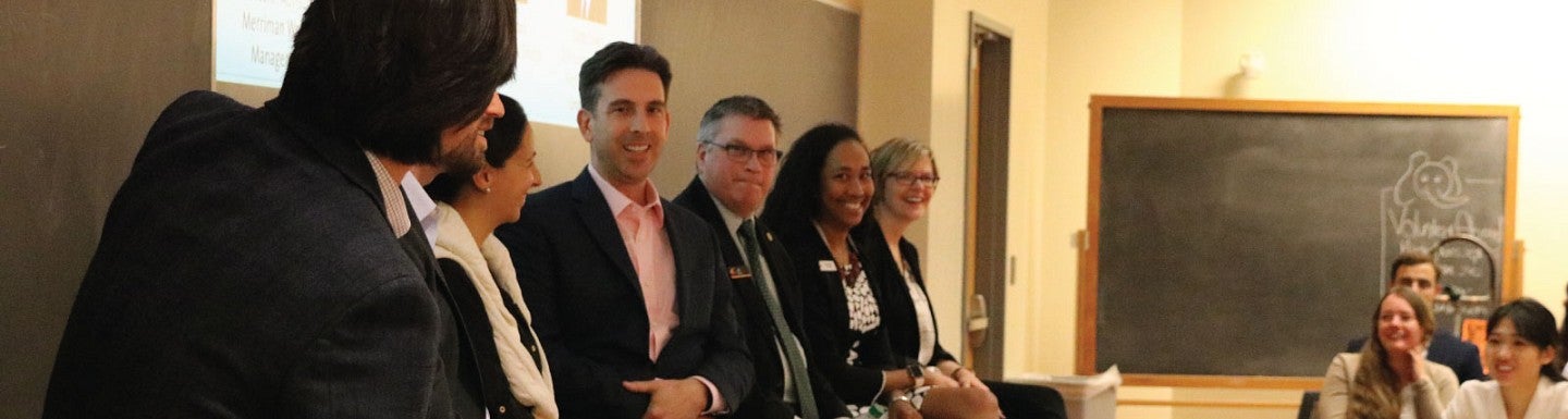 College Prepares Next Gen Bankers Panelists smile and laugh during a panel discussion