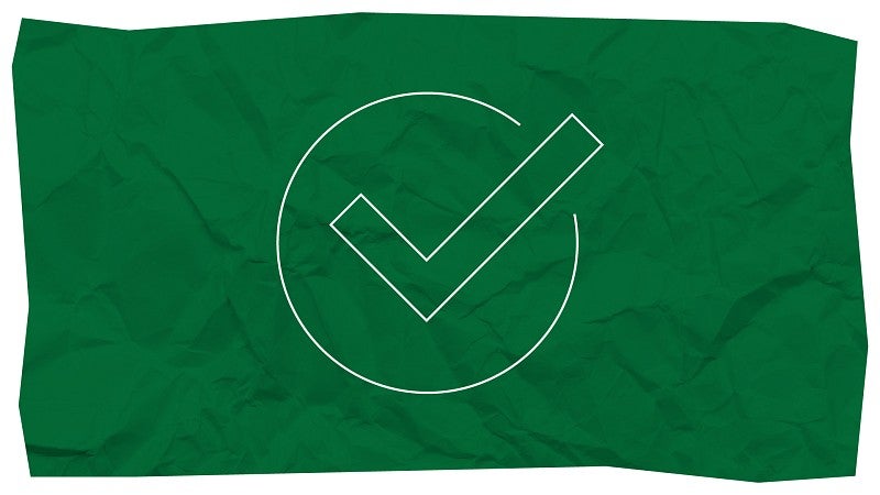 Icon of a checkmark with a circle around it.