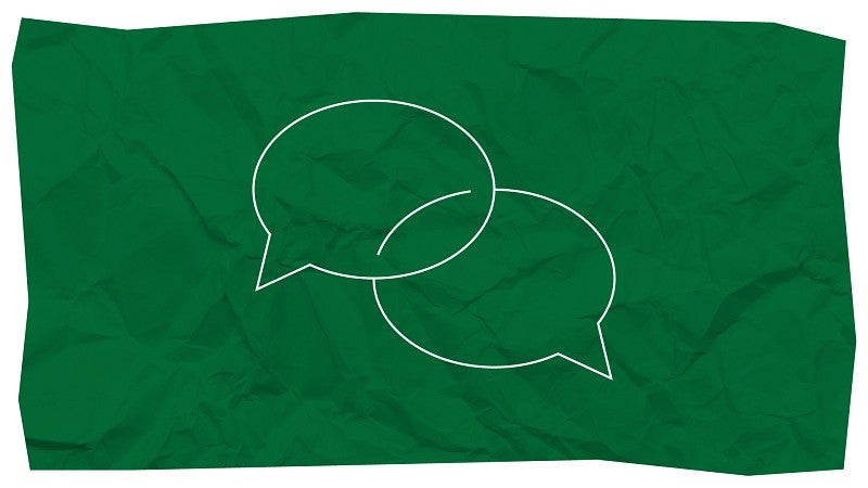 Icon of two intersecting speech bubbles.