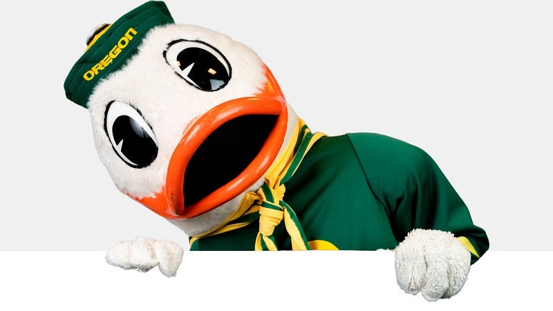 The Oregon Ducks mascot peeking up over the accompanying text.