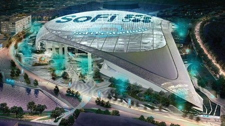 Aerial artist's rendering of So-Fi Stadium at night from an oblique angle