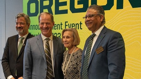 UO interim president Patrick Phillips and donors pose for a group photo during the announcement of Launch Oregon
