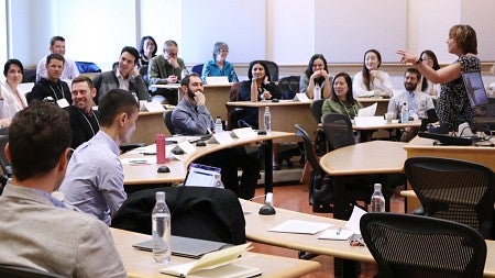 UO faculty, PhD students, and peers share a laugh during the 2017 marketing symposium