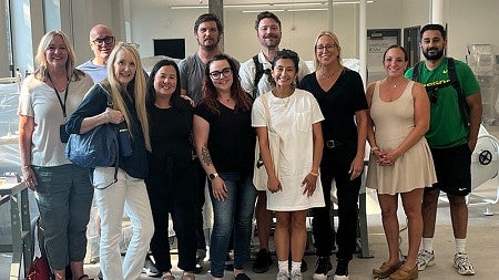 SPM staff and faculty pose for a group photo while exploring the new UO campus in northeast Portland