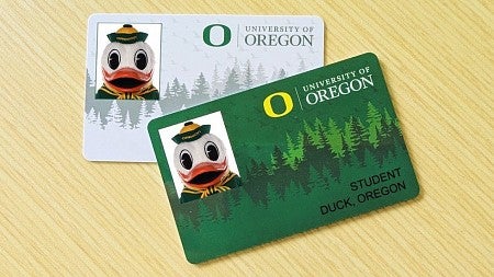 Photo of two UO Flock Cards lying on a table