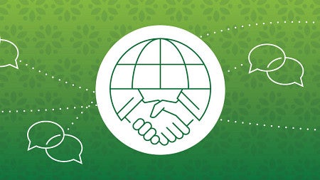 A simple line art icon of two hands shaking underneath the top half of a globe