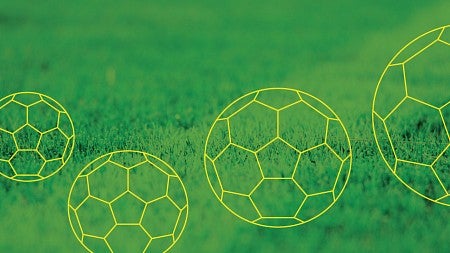 Graphic of soccer balls against background of grass