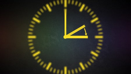 Image of a blurry line drawn clock on a dark background