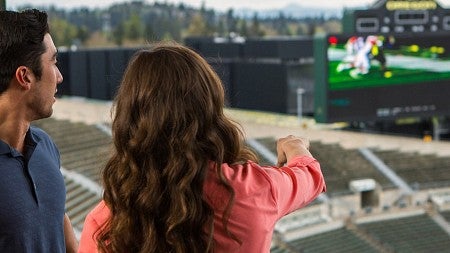 Warsaw Sports Marketing Center students discuss sponsorship ideas at Autzen Stadium