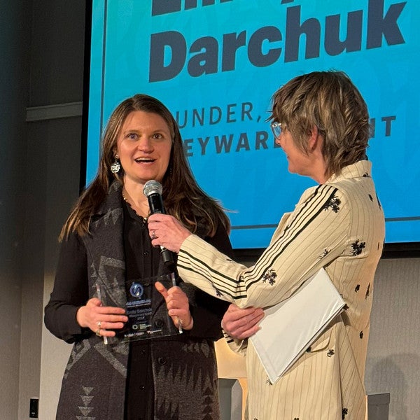 Emily Darchuk is interviewed on stage at Portland Business Journal's 40 under 40 awards.