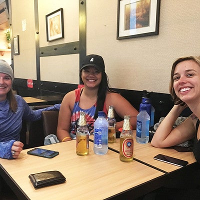 Exchange students take a break between flights