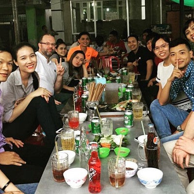 Sports Product Management interns at dinner in Vietnam
