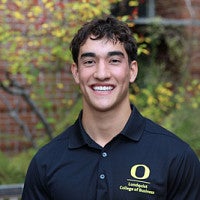 Student wearing Lundquist College of Business polo