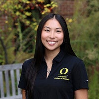 Student wearing Lundquist College of Business polo