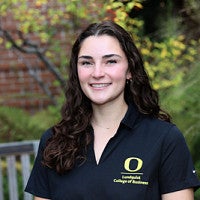 Student wearing Lundquist College of Business polo