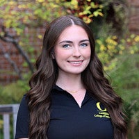 Student wearing Lundquist College of Business polo