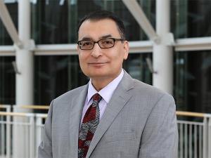 Portrait of Farhad Malekafzali